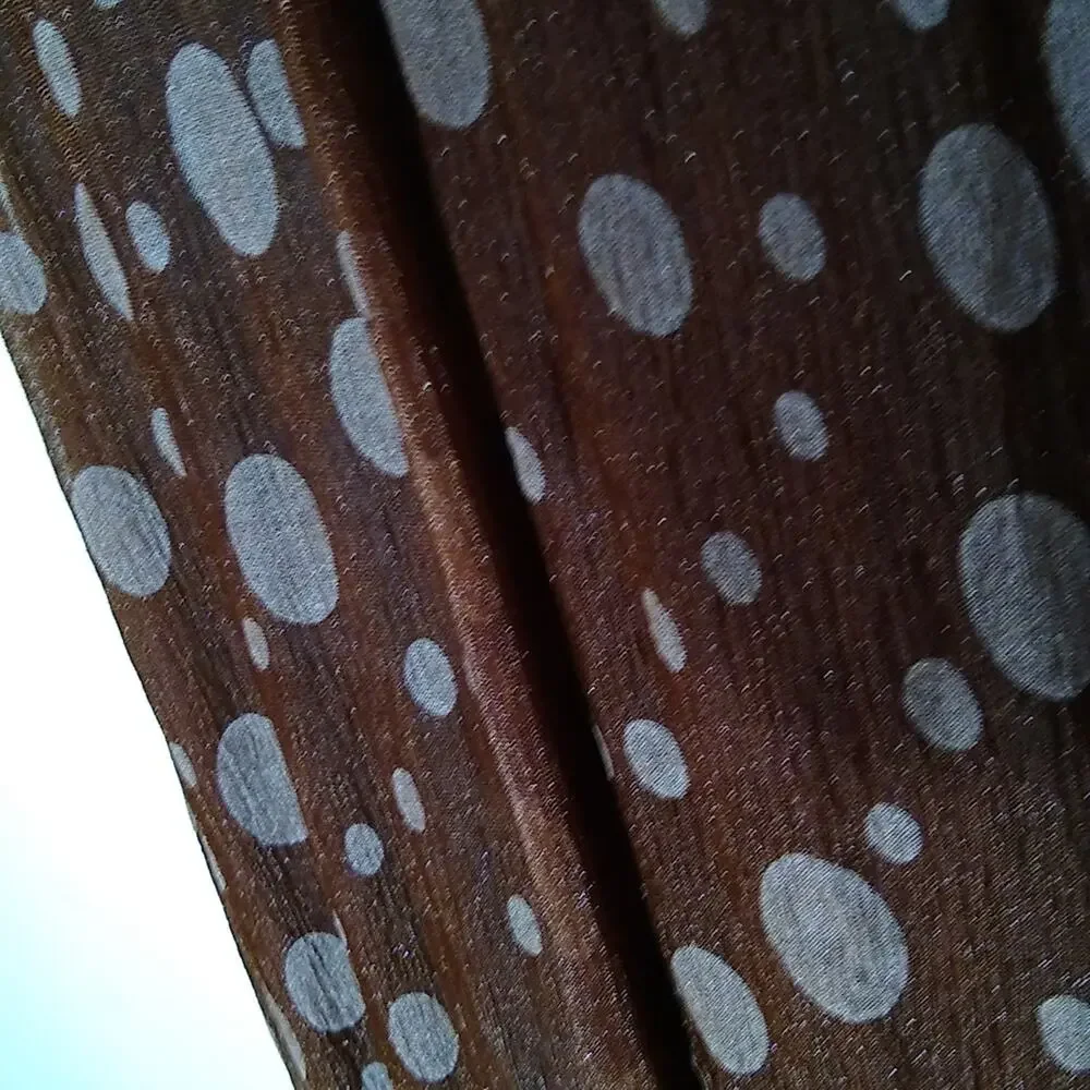 Brown polka dot women's scarf with fringe.